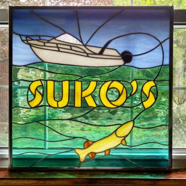 Custom stained glass sign designed for a boating and fishing enthusiast