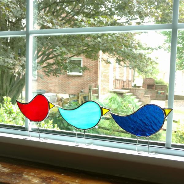 free standing stained glass birds, partridge shaped with beaks and wire legs. measure three inches by four inches.. Available in 6 colors